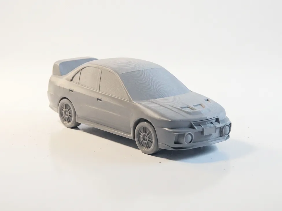 Mitsubishi Lancer Evo IV Modell | JDM Rally Legende - image3 Mitsubishi Lancer Evo IV Modell | JDM Rally Legende – Bild 3