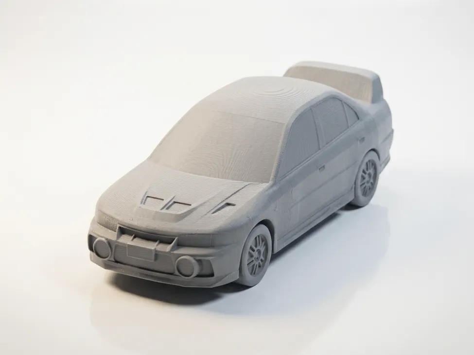Mitsubishi Lancer Evo IV Modell | JDM Rally Legende - image4 Mitsubishi Lancer Evo IV Modell | JDM Rally Legende – Bild 4