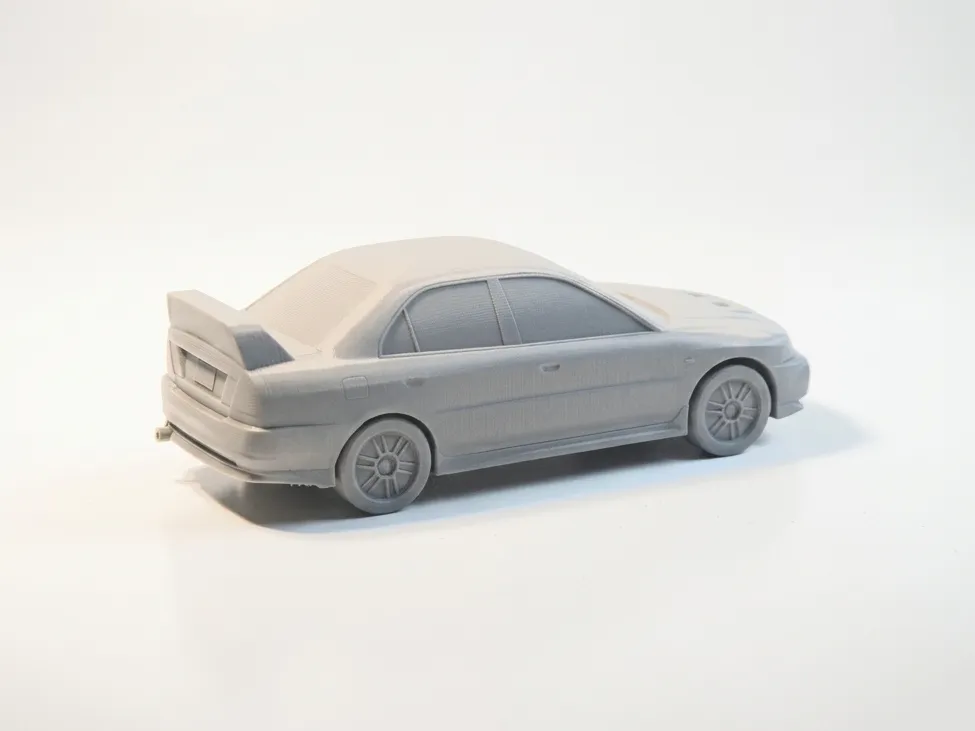 Mitsubishi Lancer Evo IV Modell | JDM Rally Legende - image5 Mitsubishi Lancer Evo IV Modell | JDM Rally Legende – Bild 5