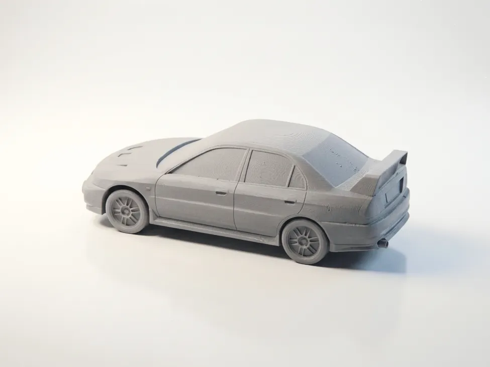 Mitsubishi Lancer Evo IV Modell | JDM Rally Legende - image6 Mitsubishi Lancer Evo IV Modell | JDM Rally Legende – Bild 6
