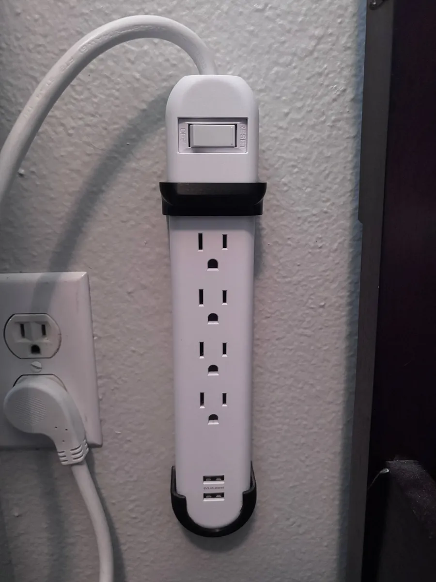 Wandhalterung für ONN Steckdosenleisten (Command-Strip Mod)