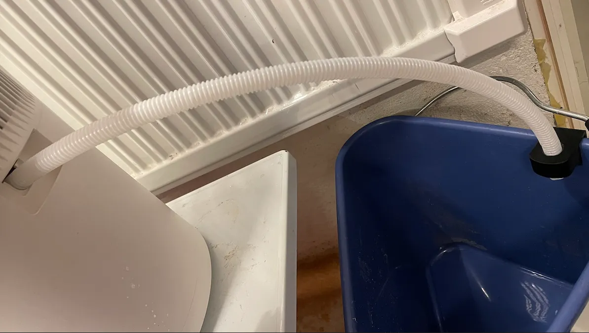 Schlauchclip für Eimer und Behälter