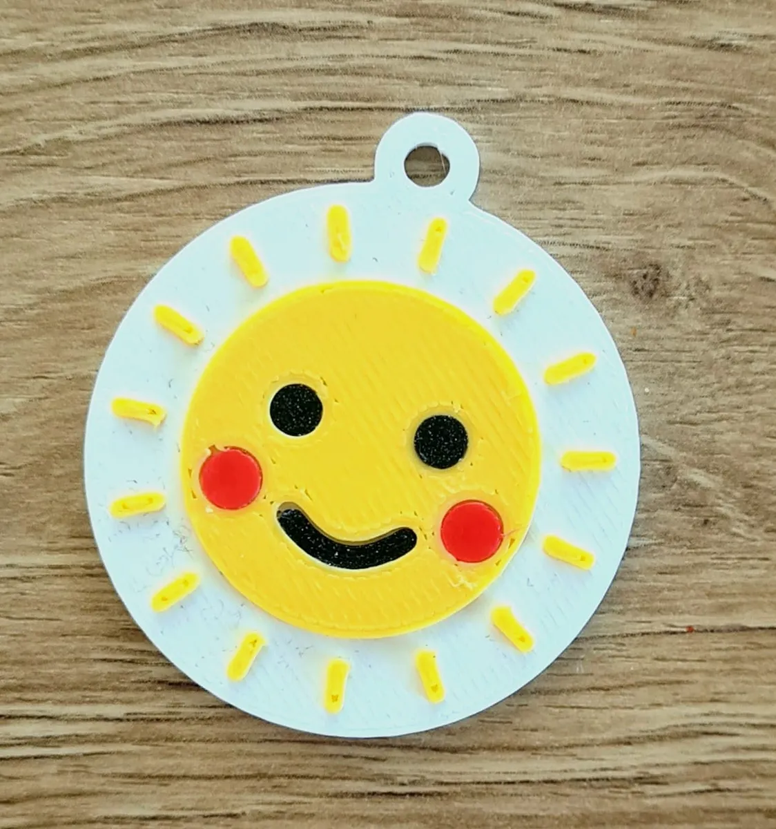 Sunny-Schlüsselanhänger mit Gesichts-Einsätzen
