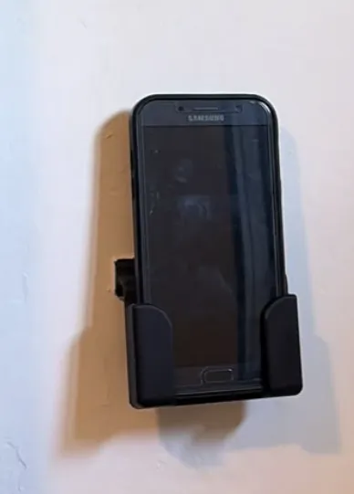 Wandhalter für Smartphones mit Kabelhalter